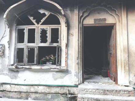 Charges framed against father, son for burning down mosque