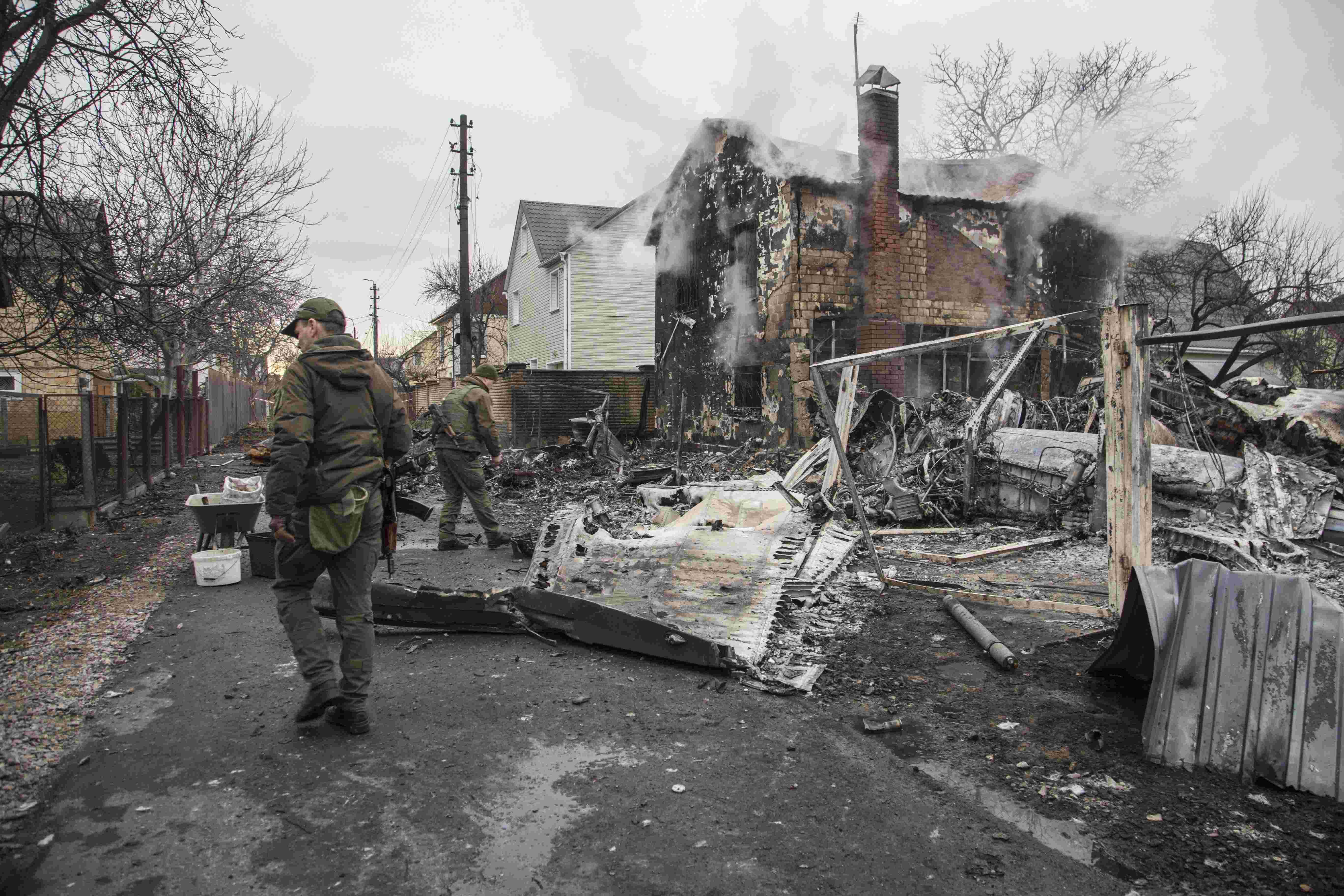 Russia hits Ukrainian cities, pours more troops into war