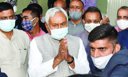 Bihar Cabinet portfolios: Nitish keeps Home, deputy Tarkishore gets Finance Bihar Cabinet portfolios: Nitish keeps Home, deputy Tarkishore gets Finance