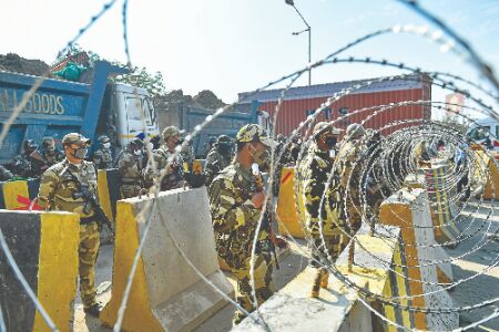 Barbed wires, water cannons await farmers at Delhi borders Barbed wires, water cannons await farmers at Delhi borders