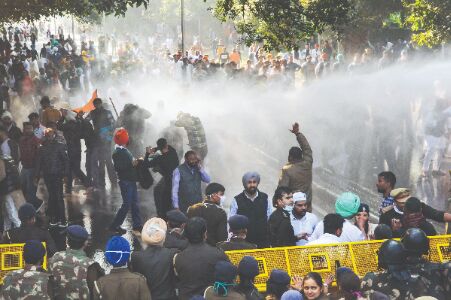 Farm laws: Cong workers try to march to Haryana CMs home, face water cannons Farm laws: Cong workers try to march to Haryana CMs home, face water cannons
