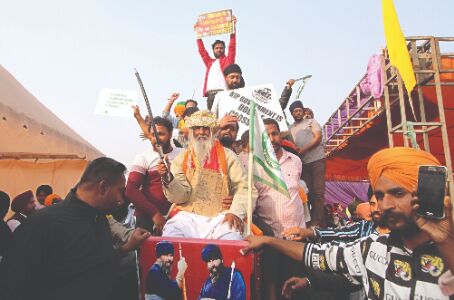 20 to 25 kms of farmers at Tikri — dotted with diverse protest posters 20 to 25 kms of farmers at Tikri — dotted with diverse protest posters