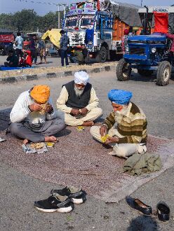 Water-proof tents keep farmers warm from bone-chilling cold