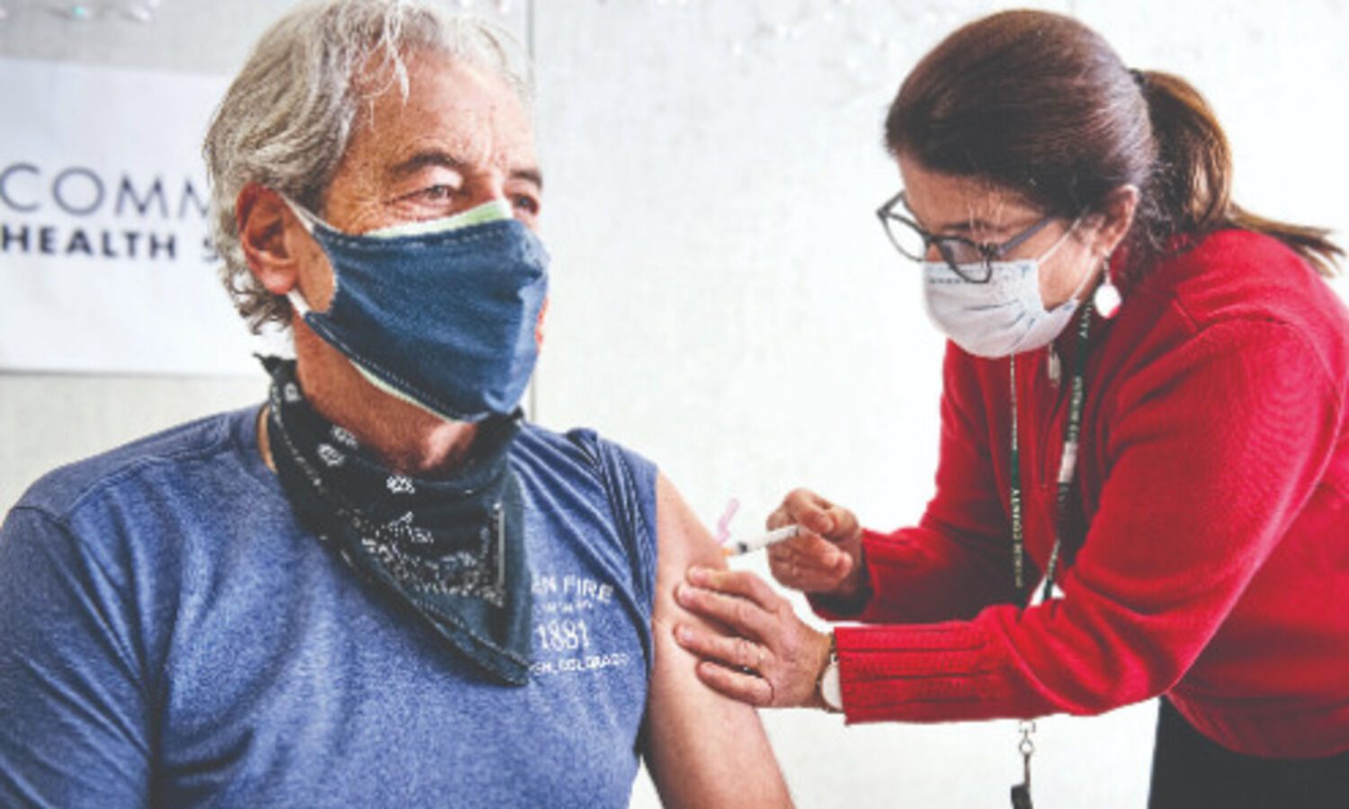 Virus dampens holidays worldwide as vaccinations gather speed