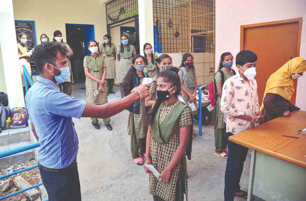 Schools reopen in Kerala, Karnataka, Assam amid strict Covid regulations Schools reopen in Kerala, Karnataka, Assam amid strict Covid regulations