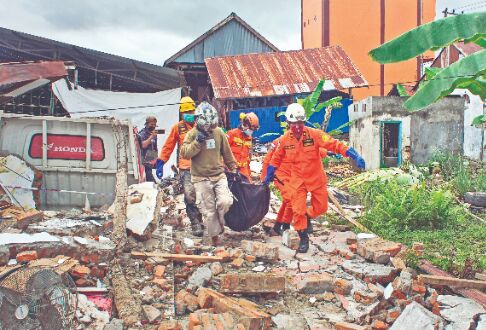 At least 34 dead, over 600 injured as Indonesia quake topples homes, buildings