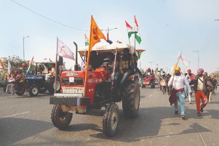 Tractor rally a matter of pride for farmers as 2 generations protest against farm laws