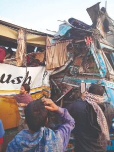 One dead, 20 hurt in head-on collision between bus & truck