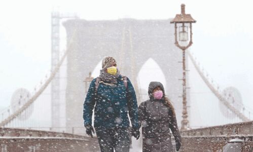 US virus deaths surpass 450K; daily toll is stubbornly high