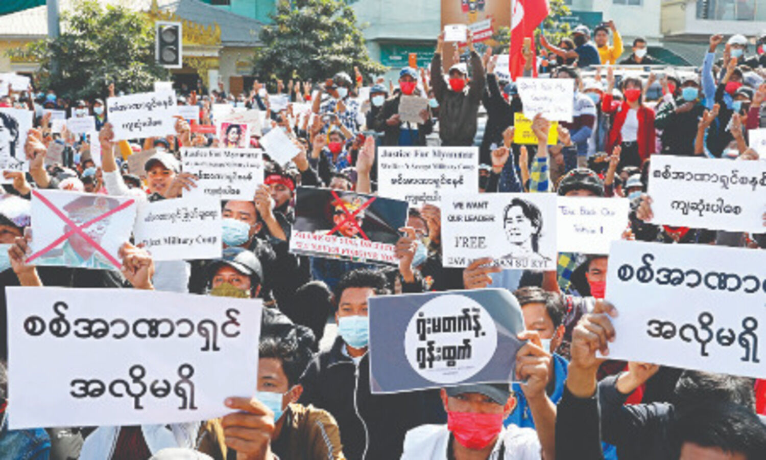 Police in Myanmar crack down on crowds defying protest ban