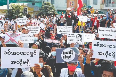 Police in Myanmar crack down on crowds defying protest ban Police in Myanmar crack down on crowds defying protest ban