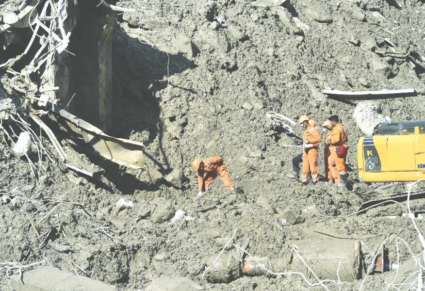 Toll rises to 50 as rescuers pull out 12 more bodies Toll rises to 50 as rescuers pull out 12 more bodies