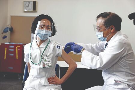 Japan begins Covid vaccination drive amid Olympic worries Japan begins Covid vaccination drive amid Olympic worries