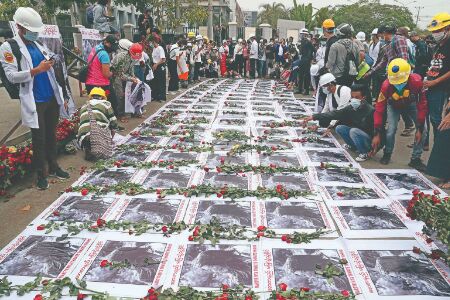 2 dead as Myanmar police open fire on anti-coup protesters 2 dead as Myanmar police open fire on anti-coup protesters