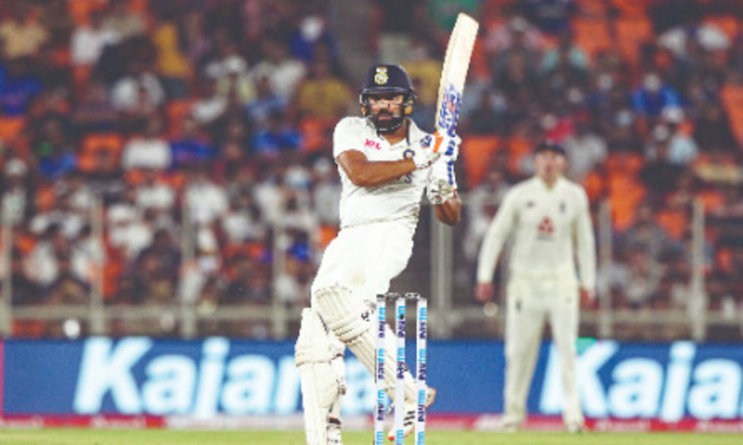 Ashwin-Axar spin combo and Rohits unbeaten 50 hand India early control