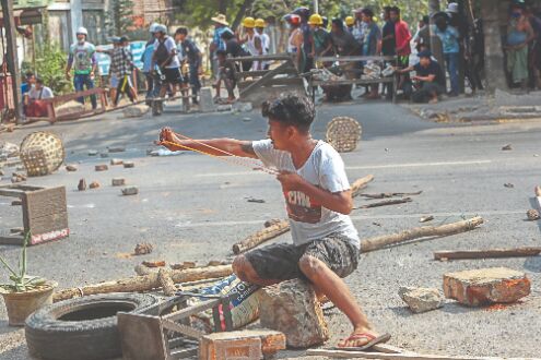 Myanmar police fire tear gas, rubber bullets at protesters Myanmar police fire tear gas, rubber bullets at protesters