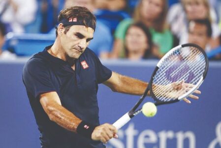 After year-long layoff, Federer returns with a win in Doha After year-long layoff, Federer returns with a win in Doha