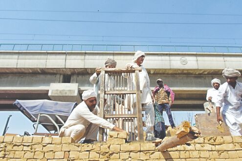 Farmers booked for raising concrete walls on NH-44 Farmers booked for raising concrete walls on NH-44