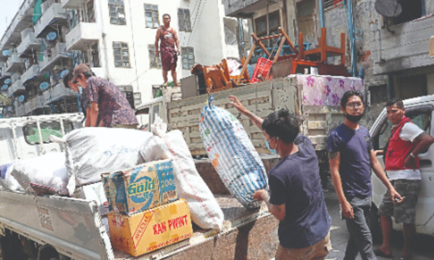 Striking Myanmar rail workers move out as protests continue