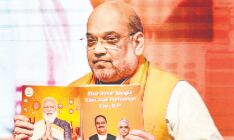 Amit Shah releases BJPs manifesto for Bengal polls Amit Shah releases BJPs manifesto for Bengal polls
