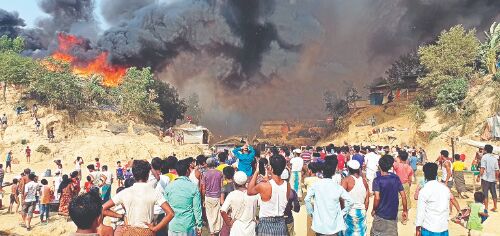 Fire guts hundreds of shelters in Rohingya refugee camp Fire guts hundreds of shelters in Rohingya refugee camp