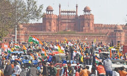 Photos of accused with flag show incitement Photos of accused with flag show incitement