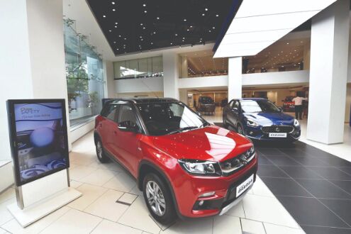 Auto firms log robust sales in March on pent up demand Auto firms log robust sales in March on pent up demand