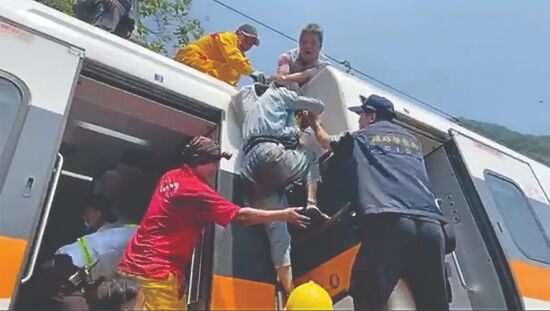 Truck knocks train off tracks in Taiwan, 48 dead Truck knocks train off tracks in Taiwan, 48 dead