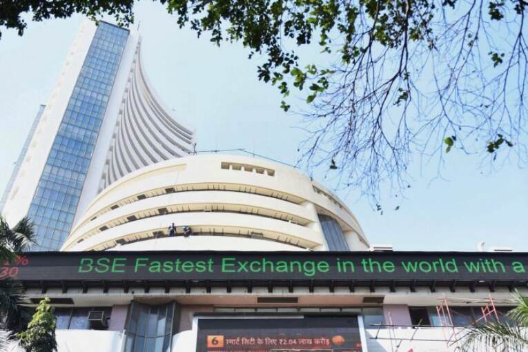 Sensex rallies 460 points, Nifty reclaims 14,800 as RBI holds rates