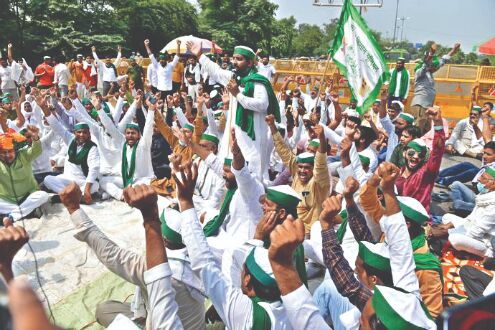 Resume talks with protesting farmers, Vij urges Tomar