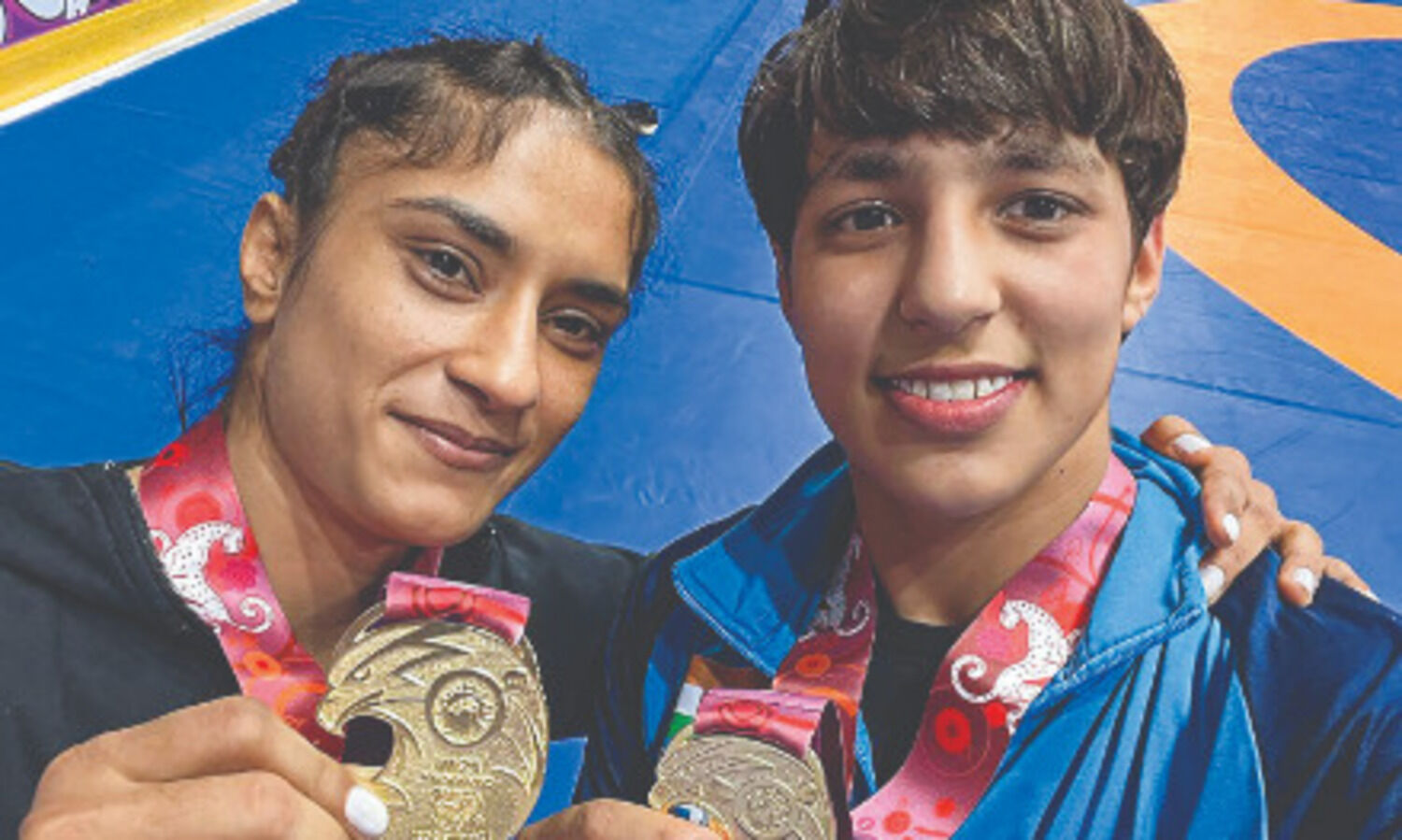 Maiden gold medals for Vinesh and teen sensation Anshu