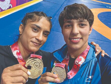Maiden gold medals for Vinesh and teen sensation Anshu Maiden gold medals for Vinesh and teen sensation Anshu