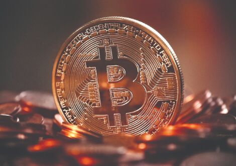 Bitcoin slumps 14% as retreat from records gathers speed Bitcoin slumps 14% as retreat from records gathers speed