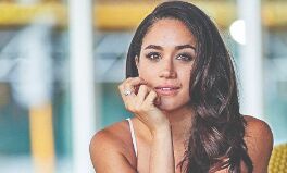 Meghan spotted with a growing baby bump