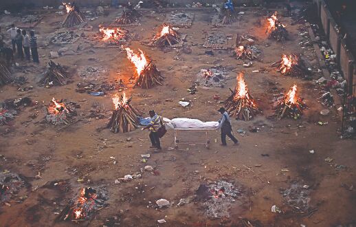Mass cremations become necessary in Delhi as bodies keep piling up Mass cremations become necessary in Delhi as bodies keep piling up