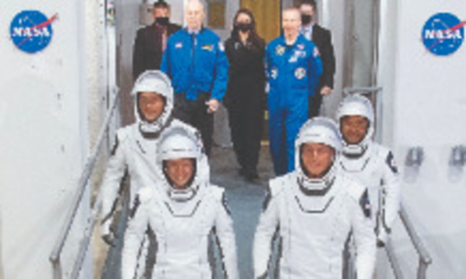 Recycled SpaceX capsule delivers four astronauts to space station