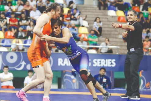 Seema Bisla gets gold; Greco Roman wrestlers bite dust Seema Bisla gets gold; Greco Roman wrestlers bite dust