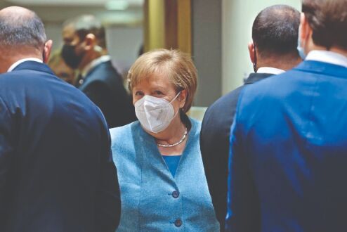 Germany lifts more curbs, Merkel urges caution Germany lifts more curbs, Merkel urges caution