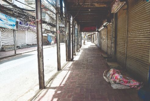 Delhi extends lockdown by one more week as daily cases touch new low
