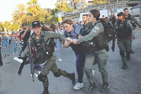 Israel arrests Jerusalem activist as reporter recovers Israel arrests Jerusalem activist as reporter recovers