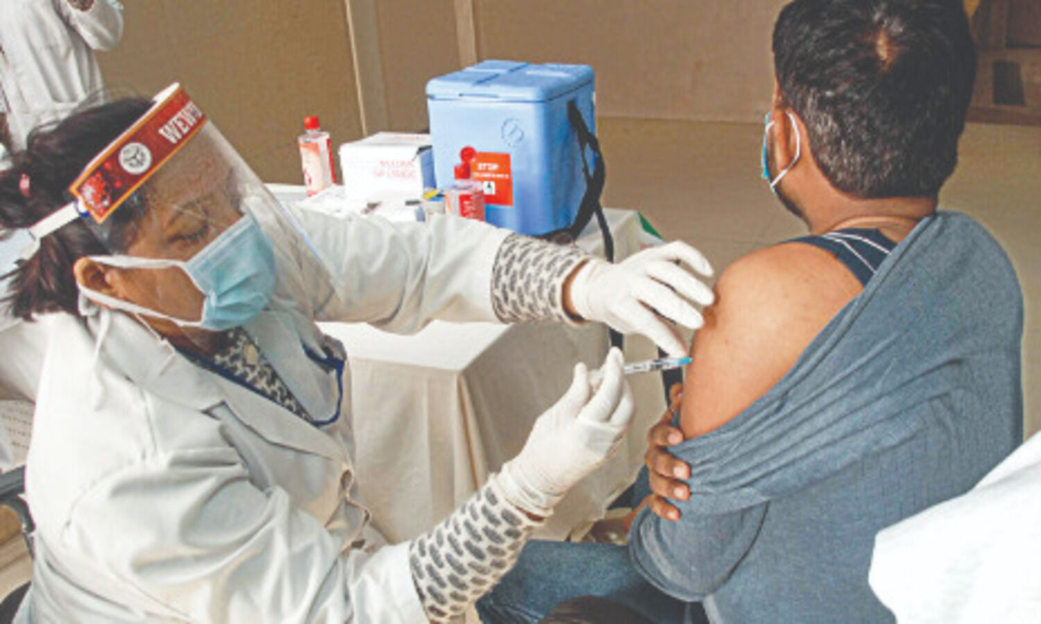 Quickening vaccination coverage critical to regain growth momentum: FinMin report