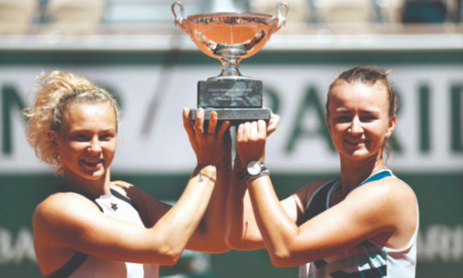 Krejcikova completes titles sweep in Paris with Siniakova