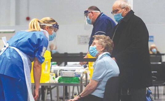 Record numbers rush for jabs as UK opens COVID-19 vaccines to all adults Record numbers rush for jabs as UK opens COVID-19 vaccines to all adults
