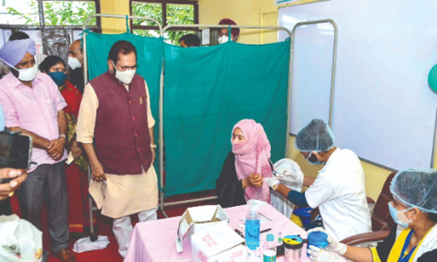 Vaccination hesitation is Corona invitation: Naqvi at launch of awareness campaign