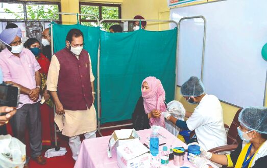 Vaccination hesitation is Corona invitation: Naqvi at launch of awareness campaign
