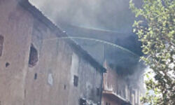 Hope fading as firefighters find charred remains Hope fading as firefighters find charred remains