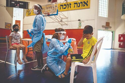 World passes three billion vaccine mark in race to contain COVID-19
