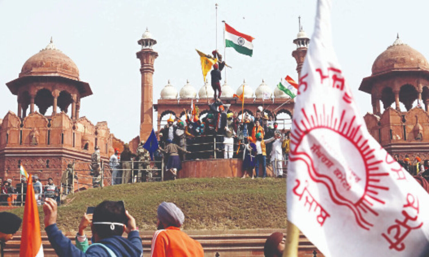 Interim arrest shield to  man who hoisted flag