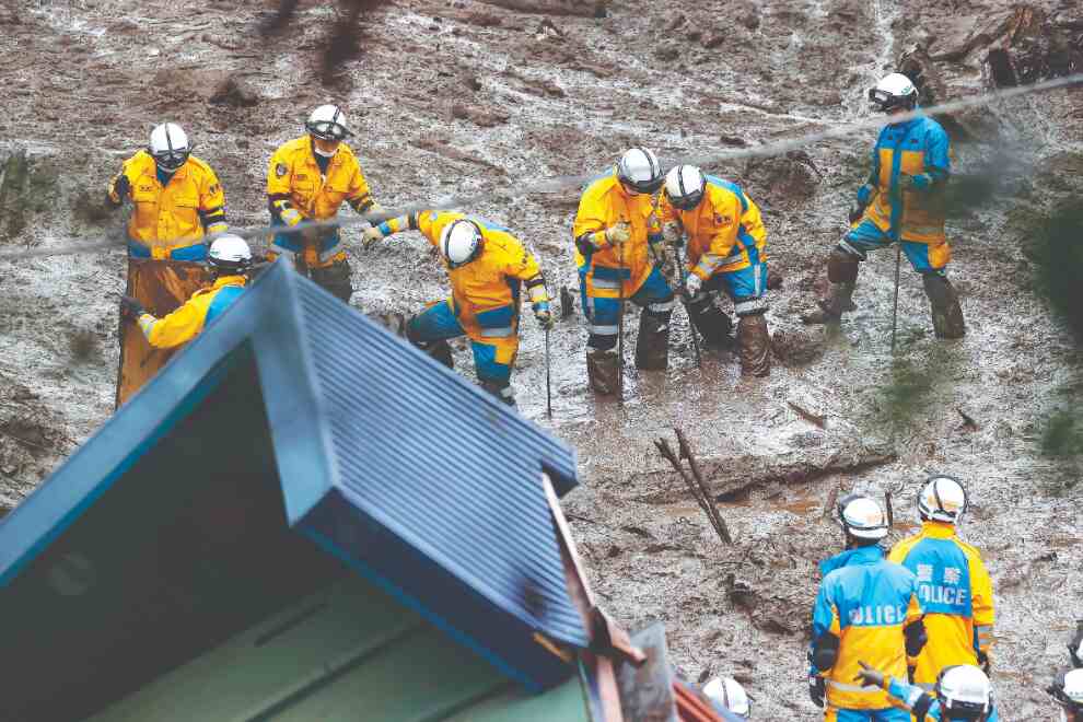 Japan searches for dozens missing in mudslide; 4 dead Japan searches for dozens missing in mudslide; 4 dead