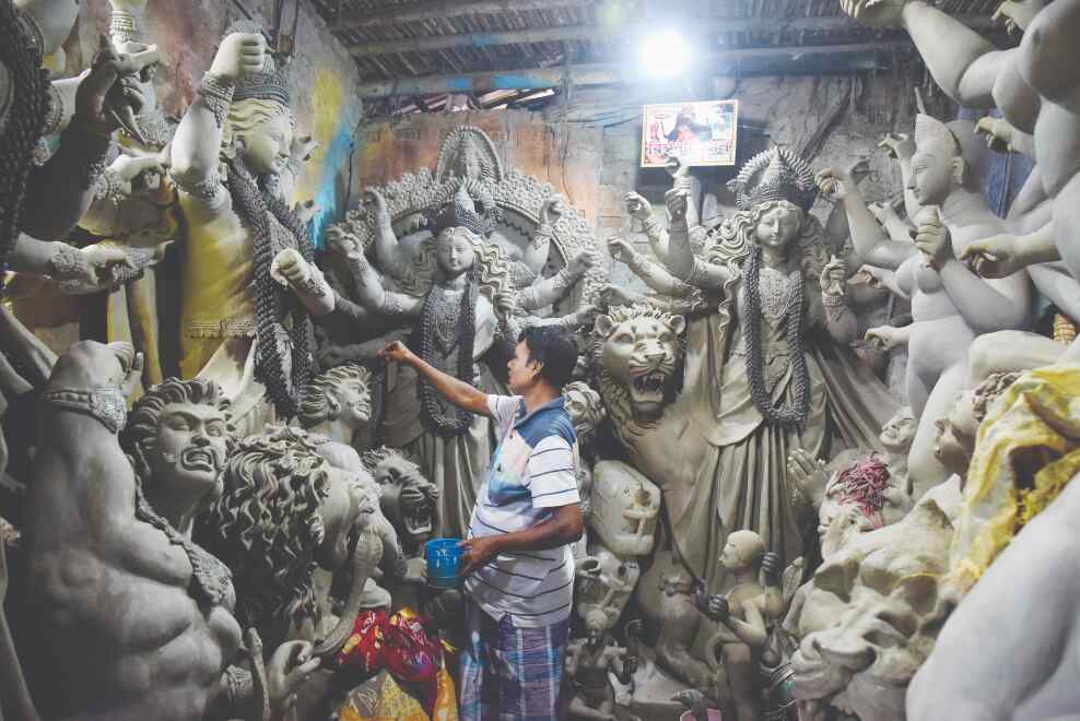 Kumartuli artisans cheer as bookings for idols increase
